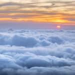 Beautiful clouds view from The Cosmiques Hut, Aiguille du Midi in the evening light, Chamonix-Mont-Blanc, France